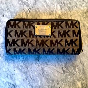 Michael Kors wallet with slight wear and tear but lots of years left!